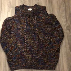 Sweater with shoulder cut outs